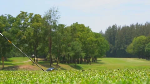 Golfer slow motion hitting golf ball in tee off zone to hole in one 스톡 동영상 106860673