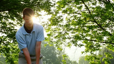 Golfer Teeing Off 558 Stock Footage