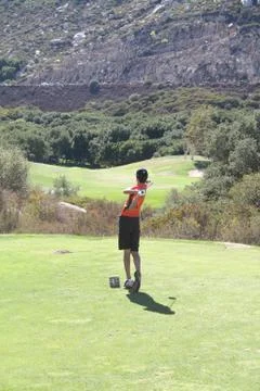 Golfer teeing off Stock Photos