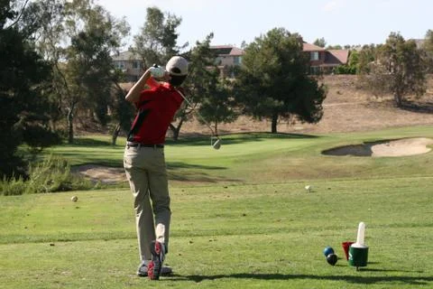 Golfer teeing off Stock Photos