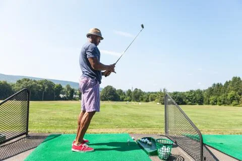 Golfer Teeing Up Stock Photos