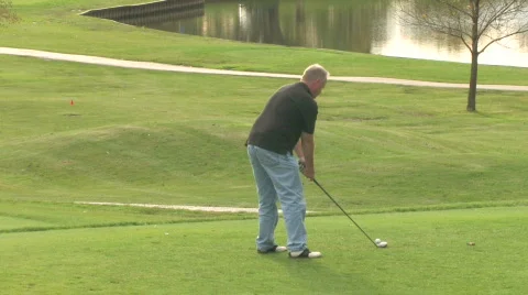 Golfer Tees Off 1 Stock Footage 279537