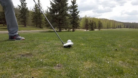 Golfer tees off on golf course Video stock 108506452
