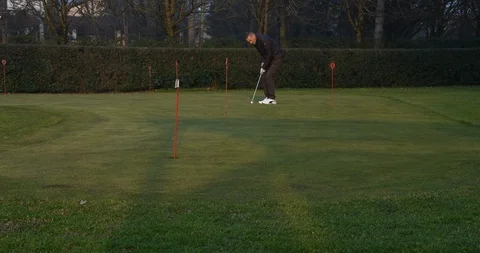 Golfer training in the green time lapse Stock-Footage 123030054