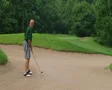 Golfer Uses Wedge In Bunker SD Footage
