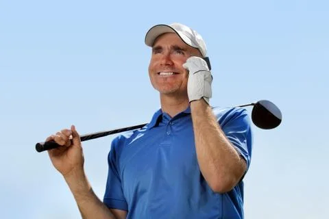 Golfer using mobile phone Stock Photos