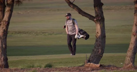 Golfer walking down fairway on Troon Links, golf course, 4k 120fps, Scotland UK  Stock Footage 188370190