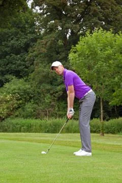 Golfer wedge shot Stock Photos