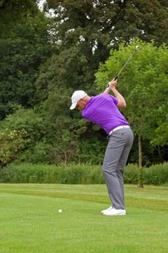 Golfer wedge shot Stock Photos