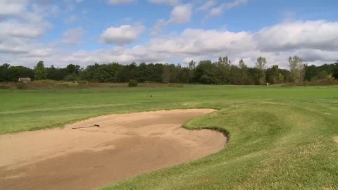 Golfers with bunker pan Stock Footage 69191497