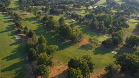 Golfers on Golf Course from an Aerial View 4K Stock Footage 217384103