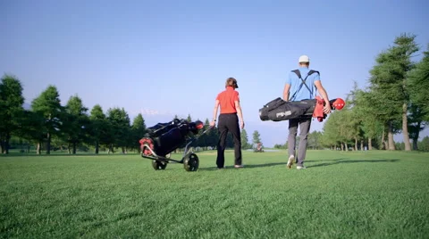 Golfers on golf course Video stock 41470369