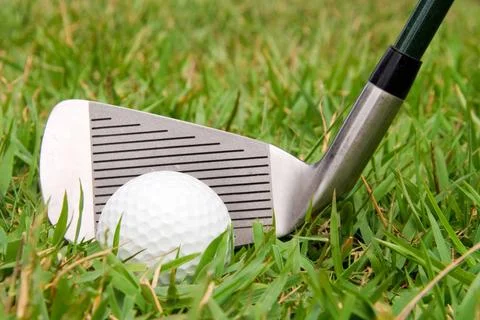 Golfing A driver just before it hits a golf ball. (License=RF) 2443897 Cop... Stock Photos