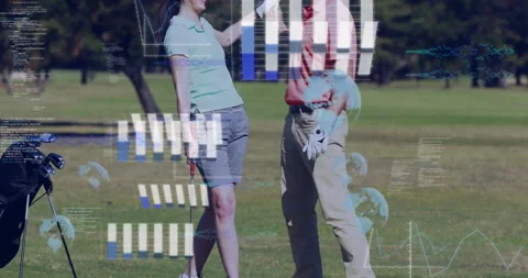 Golfing pair celebrating golf shot on fairway, with animated tech charts code Stock Footage 307452812