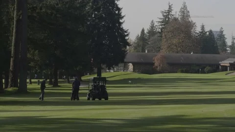Golfing. Players playing on the fairways. 動画素材 142607420