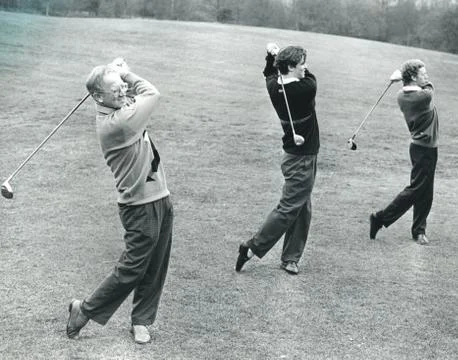 Golfing practice, 1980s Fotos de archivo