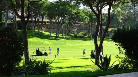 Golfing in Quinta do Lago Golf Course, Algarve, Portugal Stock Footage 149675374
