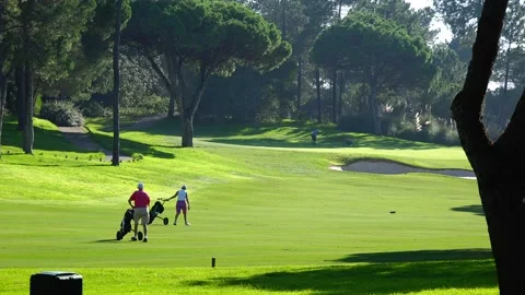 Golfing in Quinta do Lago Golf Course, Algarve, Portugal Stock Footage 149709237