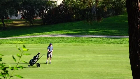 Golfing in Quinta do Lago Golf Course, Algarve, Portugal Stock Footage 149719514