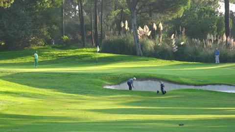 Golfing in Quinta do Lago Golf Course, Algarve, Portugal Stock Footage 149741202