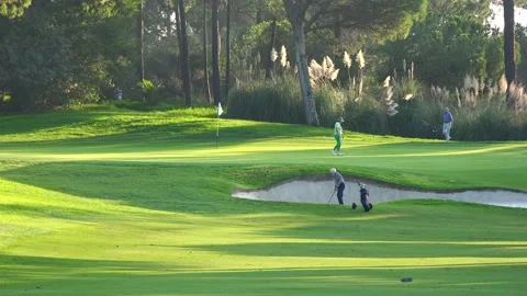Golfing in Quinta do Lago Golf Course, Algarve, Portugal Stock Footage 149748001