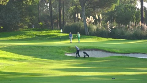 Golfing in Quinta do Lago Golf Course, Algarve, Portugal Stock Footage 149758050