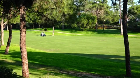 Golfing in Quinta do Lago Golf Course, Algarve, Portugal Stock Footage 149765562