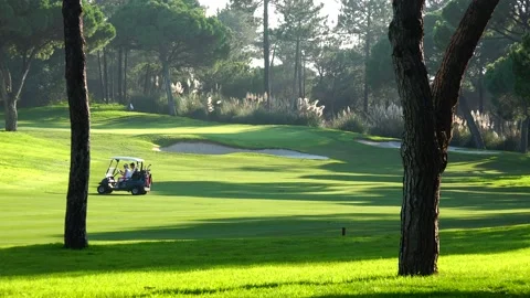 Golfing in Quinta do Lago Golf Course, Algarve, Portugal Stock Footage 149777410