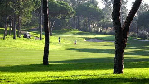 Golfing in Quinta do Lago Golf Course, Algarve, Portugal Stock Footage 149783155