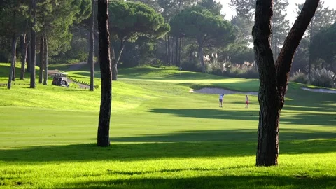Golfing in Quinta do Lago Golf Course, Algarve, Portugal Stock Footage 149787147