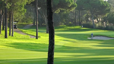 Golfing in Quinta do Lago Golf Course, Algarve, Portugal Stock Footage 149794048