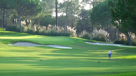 Golfing in Quinta do Lago Golf Course, Algarve, Portugal Stock Footage 149801070
