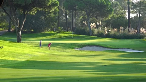 Golfing in Quinta do Lago Golf Course, Algarve, Portugal Stock Footage 149803316