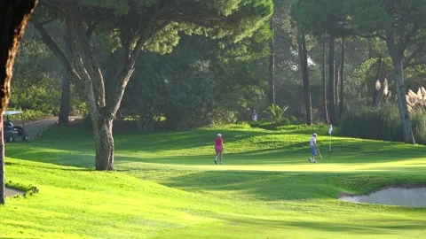 Golfing in Quinta do Lago Golf Course, Algarve, Portugal Stock Footage 149806850