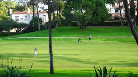 Golfing in Quinta do Lago Golf Course, Algarve, Portugal Stock Footage 149831908