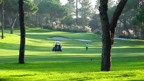 Golfing in Quinta do Lago Golf Course, Algarve, Portugal Stock Footage 149834370