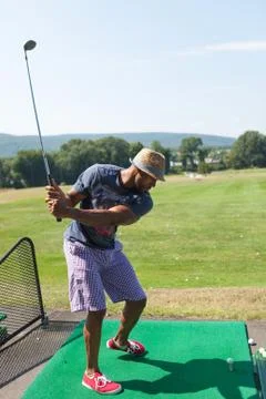 Golfing at the Range Stock Photos