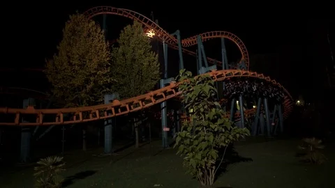 Goliath Rollercoaster at night - 4K Stock Footage 73669883