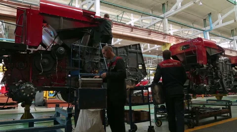 Gomel, Belarus, May 5, 2015: Workers collect Agricultural machinery at factory Stock Footage 60126251