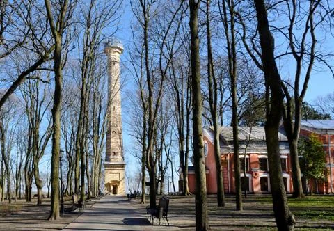 Gomel park. The tower remained from a former sugar factory. In the undergroun Stock Photos