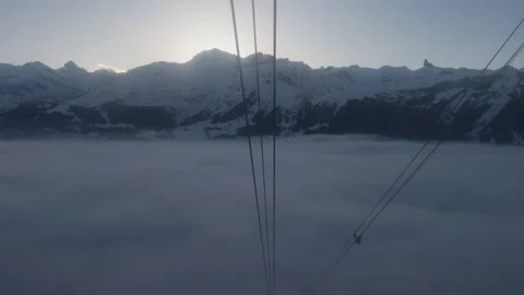 Gondola ascending through the clouds Stock Footage 319842213