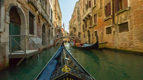 In gondola on the canals of Venice, Italy Stock Footage