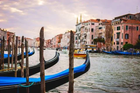 Gondola on the Grand Canal during sunset in Venice, Italy Stock Photos