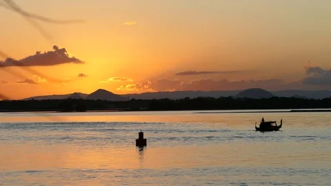 Gondola Rowing Slowly In The Sunset Stock Footage 76337378
