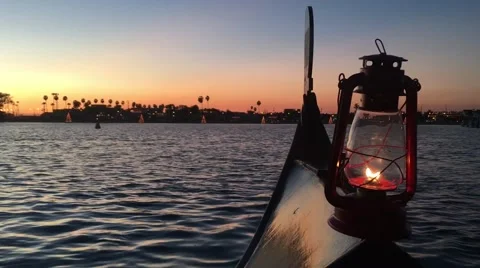 Gondola at sunset with lantern at front of boat Los Angeles California Stock Footage 61863336