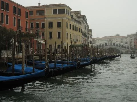 Gondolas and Rialto bridge in Venice, Italy Stock Photos