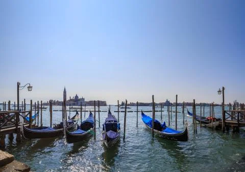 Gondolas on the background of the lagoon Stock Photos