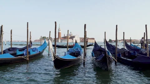 Gondolas floating in front of san giorgio maggiore in venice Stock Footage 293848017