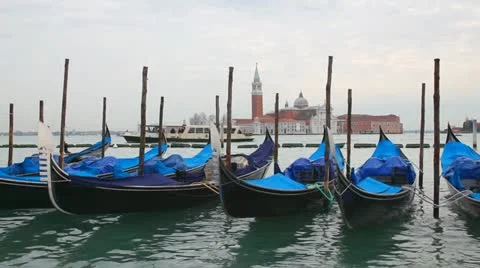 Gondolas floating in the Grand Canal on a cloudy day Stock Footage 20487867