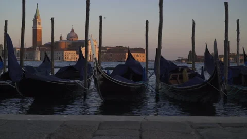 Gondolas in the harbor of Venice during sunset, Venice, 4k Stock Footage